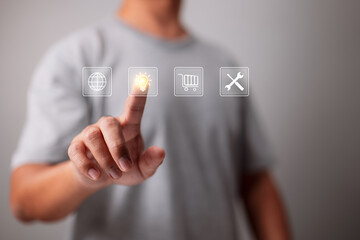 Digital screen interface, a businessman touches a light bulb icon and Big data analytics visualization technology and innovation concept.