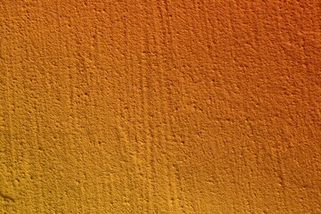 orange weathered stone with broken paint texture - nice abstract photo background