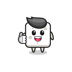 sugar cube mascot doing thumbs up gesture