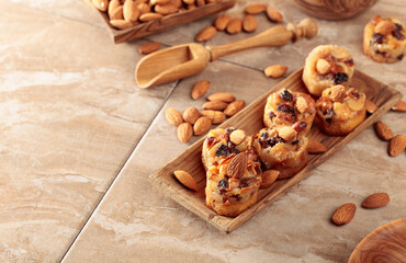 Small cakes with almonds, raisins, and honey.