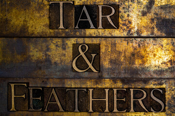 Tar and Feathers text on textured grunge copper and vintage gold background