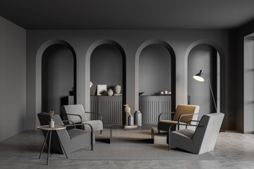 Dark living room interior with armchairs, coffee table and commode