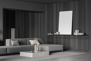 Fototapeta premium Grey living room with canvas standing on frame sideboard. Corner view.