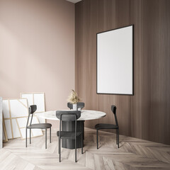 Canvas on wood wall of beige living room with table. Corner view.