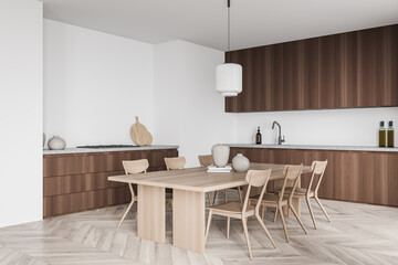 Corner view of modern wood kitchen with dining table