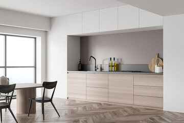 Corner view on bright kitchen room interior with white wall