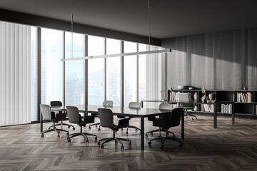 Dark wood office with meeting table and CEO working place. Corner view.