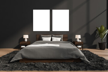 Modern grey bedroom with two empty canvases