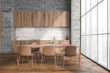Minimalist wood kitchen with concrete wall and floor to ceiling windows