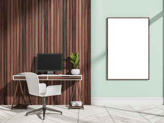 White mockup frame on green wall of wooden home office