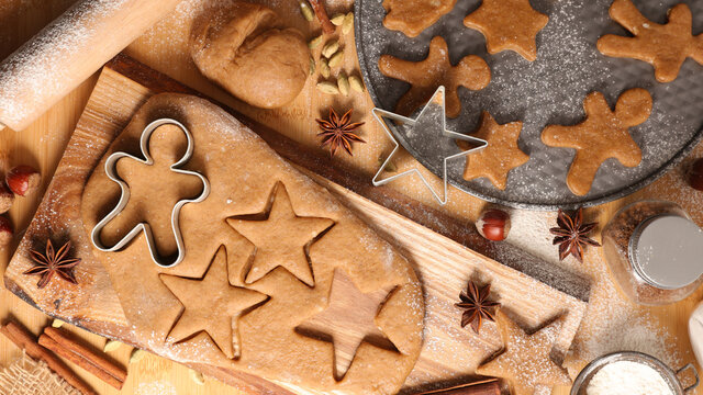 making christmas cookies- raw dough and mold