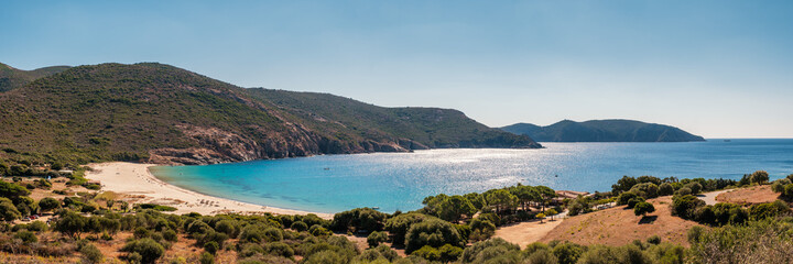 Naklejka premium Panoramic view of Plage d'Arone beach and turquoise mediterranean sea on the west coast of Corsica