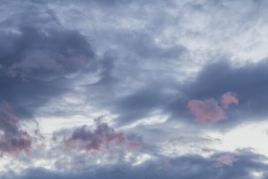 magenta pink red sunset sky with storm clouds