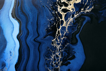 Dark blue waves in abstract ocean and golden inclusion. Liquid acrylic artwork with flow and splash. Marble effect background or texture