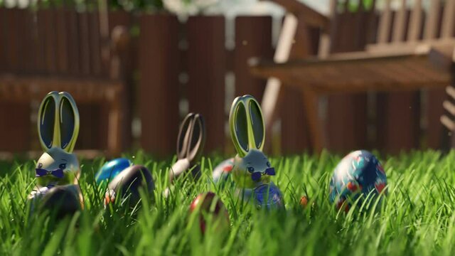 Easter egg hunt. Cute chocolate bunnies and eggs are hidden in green grass.