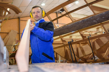 a carpenter is at work