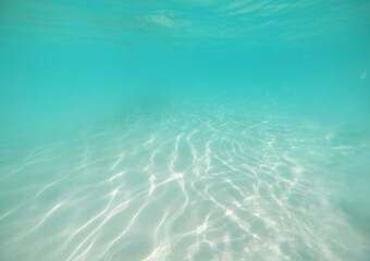 Fototapeta na wymiar Beautiful texture of transparent sea water