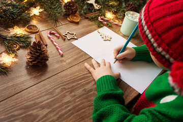 Little Kid Writing Letter to Santa, Merry Christmas Wishes and Happy New Year Greeting Card. Cute...