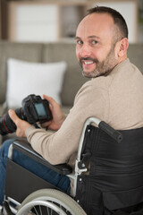 Fototapeta na wymiar wheelchair photographer is at work