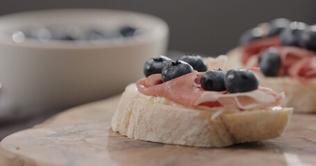 blueberries with prosciutto on ciabatta with cream cheese