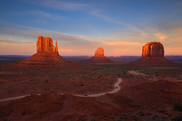 beautiful scenic sandstone buttes with sunrise sky, Monument Valley, Landmark of Arizona Utah border.