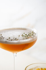 Ready bright yellow cocktail on white background among other cocktail