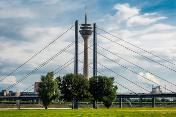 Rhine tower in Düsseldorf behind the rhine bridge, germany