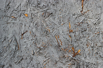 the texture of wood chips, with pressed gray chips