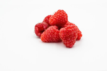 Raspberries on white background