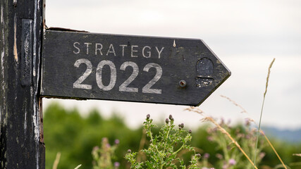 Strategy 2022 written on a wooden sign