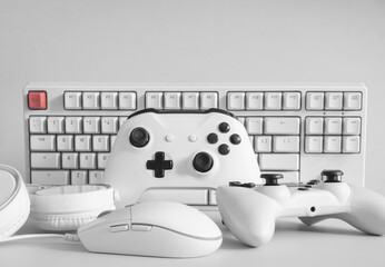 gamer work space concept with gaming gear, mouse, keyboard, joystick, and headset