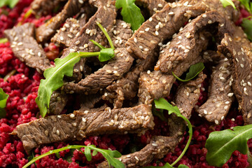 Bulgur salad with beetroot and roast beef. Healthy diet food