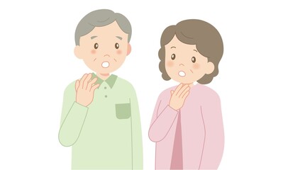 不安そうに顔を見合わせるシニアの男女