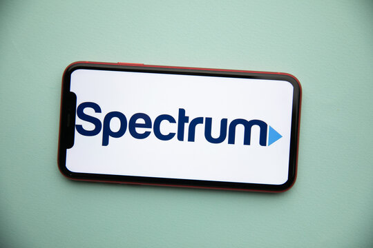 Tula, Russia - September 07, 2021: Spectrum logo on iPhone display
