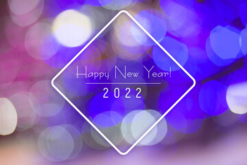 2022 new year card on blue bokeh background