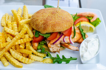 Grilled salmon sandwiches with french fries