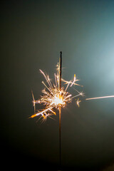 Burning Bengali fire against a dark background