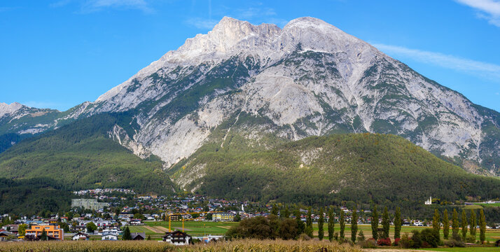 Telfs village with mountains in the background