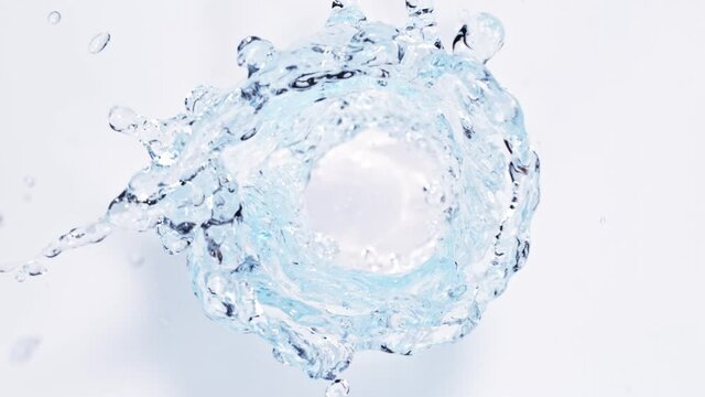 Super slow motion of rotating water on whte background. Filmed on high speed cinema camera, 1000 fps.