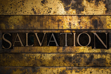 Salvation text message on textured grunge copper and vintage gold background