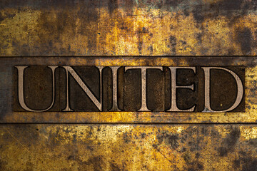 United text message on textured grunge copper and vintage gold background