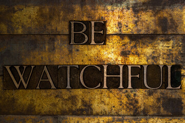 Be Watchful text on textured grunge copper and vintage gold background