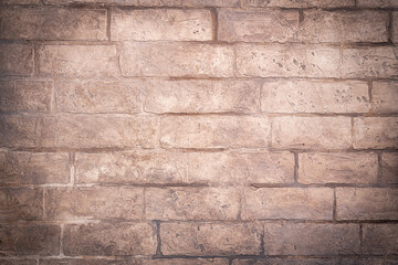 Light brown Background of old vintage dirty brick wall, texture