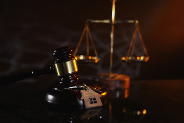 Law and Justice. Judge gavel and wedding rings close-up