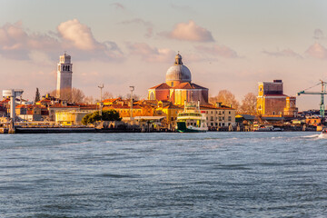 Fototapeta premium Venice city skyline from boat, view of Basilica of San Pietro di Castello, Venice, Italy