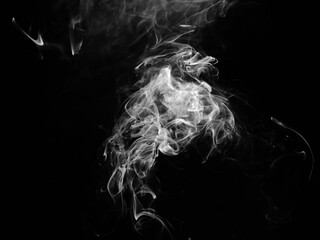 abstract fragment movement of white smoke on black background.