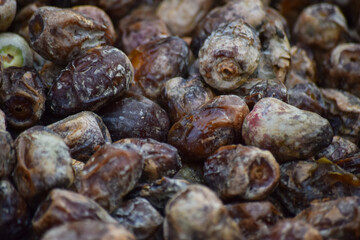 Dates fruit close up, fresh raw ripen sweet palm food Ramadan ingredient photo