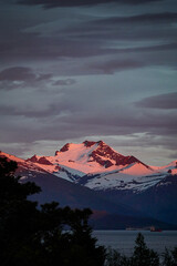 Evening light hitting the tops of the Sunnmøre Alps, Norway © Hennie