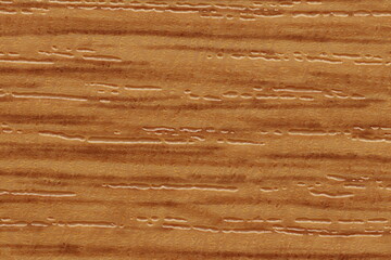 Fototapeta na wymiar PVC plastic texture with wood pattern for edging chipboard ends. Texture of decorative wood backgrounds. 