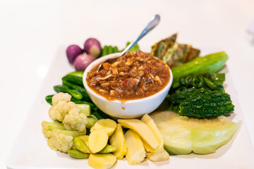 Thai spicy crab egg chili paste with fresh vegetable and herb.